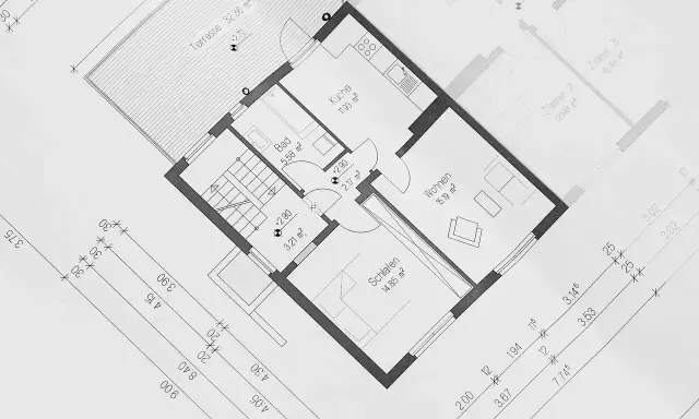 Plan domu z zaznaczonym metrażem pomieszczeń: kuchnia, łazienka, salon, sypialnia i taras. Wymiary podane w m².